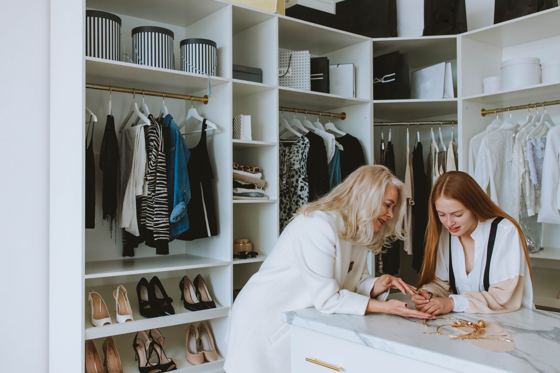 Close-up of an organised wardrobe rail reflecting intentional dressing and a considered approach to personal style